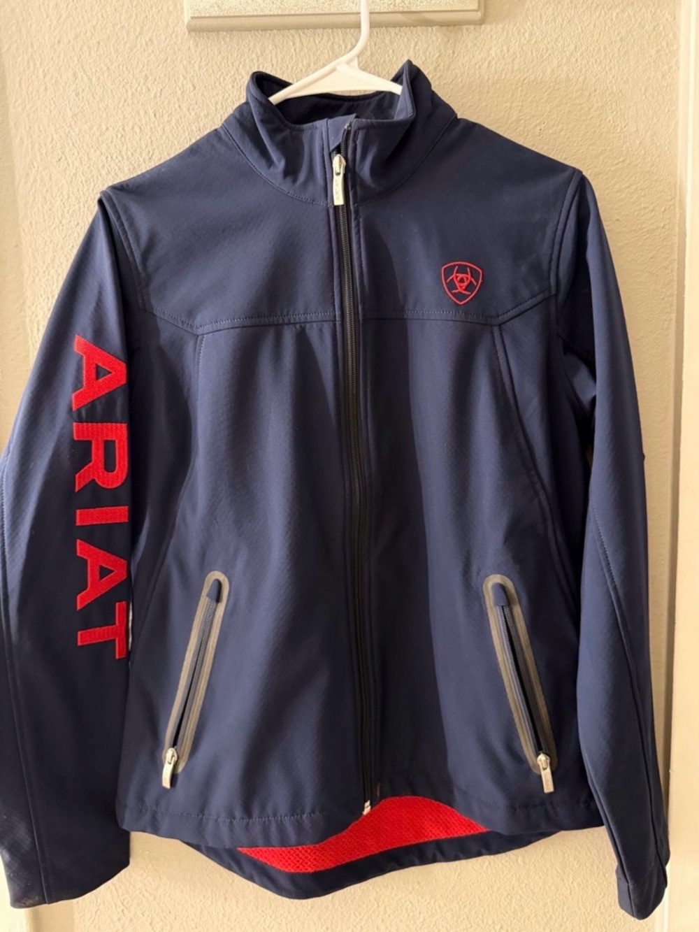Ariat Navy Jacket with Red Branding